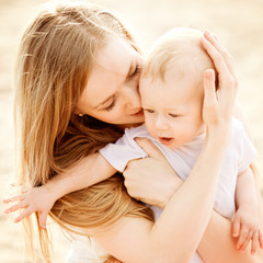 Happy family. Baby with mother