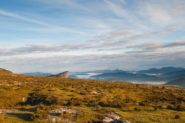 Valley view at sunrise from the top of the mountains