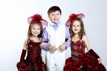 Little girl in beautiful dress and boy
