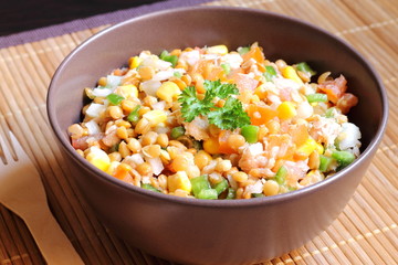 Lentil salad with tuna, tomato, onion, bell pepper and corn