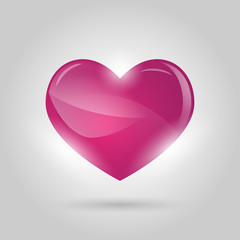 glowing heart on gray background