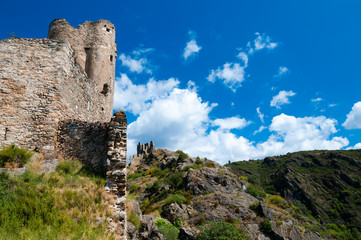 Quertinheux tower and walls on great landscape at Lastours