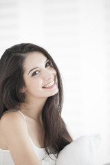 Beautiful woman on a bed