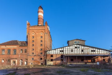 Fotobehang The buildings of the old factory © Mariusz Niedzwiedzki