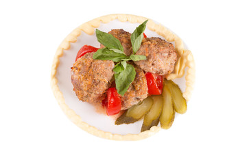 lula lamb and tomato on a plate