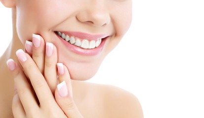Face, hands and healthy white teeth of a woman