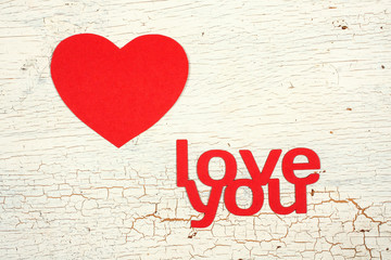 Paper heart on a wooden background