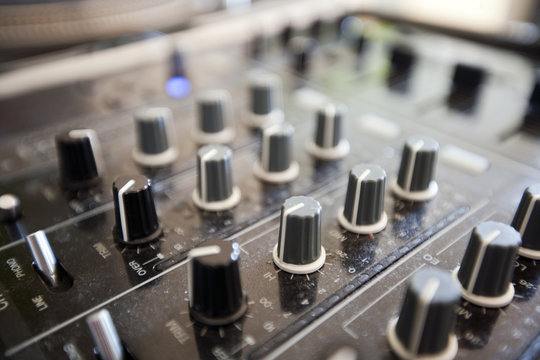 Close up of knobs on audio console