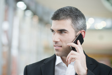 Close-up of businessman on mobile phone