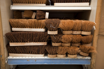 Stacked brushes in supermarket
