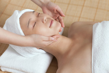 Fototapeta na wymiar .A young woman enjoy massage.