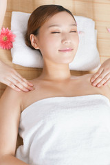 Obraz na płótnie Canvas .A young woman enjoy massage.