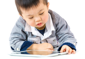 Asian baby boy using tablet