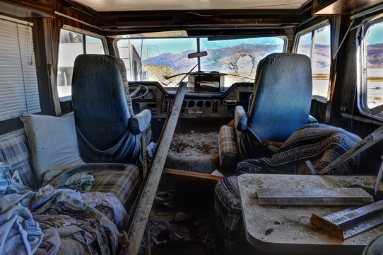 Old abandoned RV with broken windshield