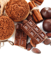 Composition of chocolate sweets, cocoa and spices, isolated