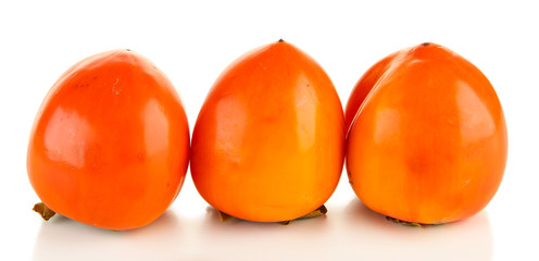 Ripe persimmons isolated on white