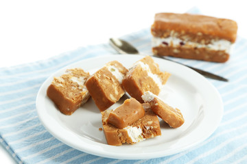 Sherbet with nuts on plate isolated on white