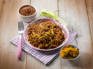 red rice with curry and leek