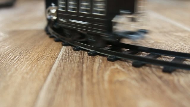 Black train toy. Selective focus with shallow depth of field.