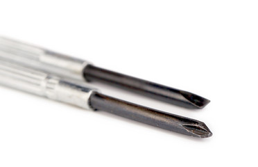 Close up of two screw tips.