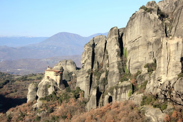 greek orthodox church and monastery on a pinnacle of rock in meteora	