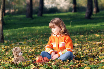 little girl with teddy bear