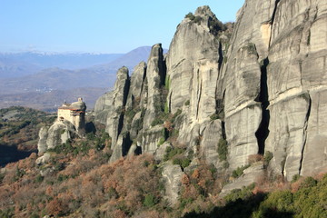 greek orthodox church and monastery on a pinnacle of rock in meteora	