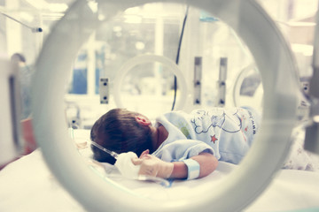 Newborn baby inside incubator © Nenov Brothers