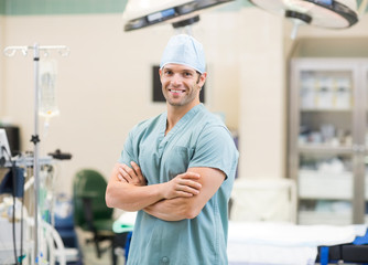 Surgeon Standing Arms Crossed In Operation Room