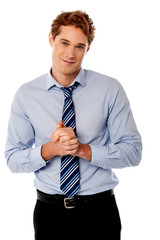Corporate guy posing with clasped hands