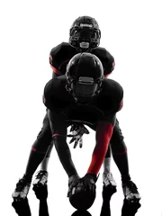 Tuinposter two american football players on scrimmage silhouette © snaptitude