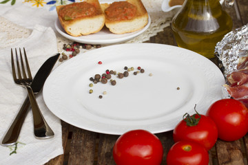 empty plate with tomatoes
