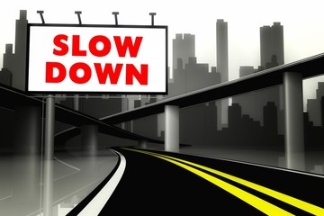 Slow down road sign on highway in big city