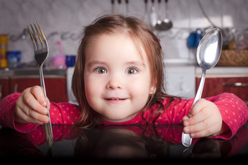 Little girl in the kichen