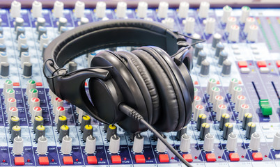 Obraz na płótnie Canvas Headphone on mixer