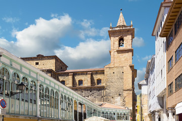 Fototapeta premium oviedo street with the church of San Isidoro in the background