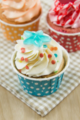 Tasty cupcake with butter cream