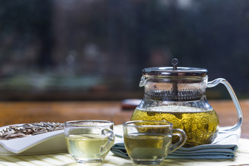 cup and teapot of green tea