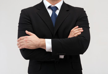 Obraz na płótnie Canvas close up of buisnessman in suit and tie