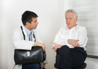 Fototapeta premium Senior man with young doctor