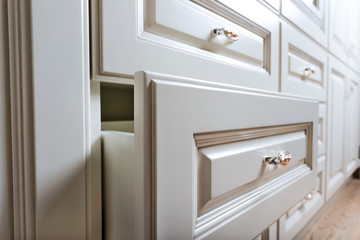 beautiful cabinet with drawers in a modern room