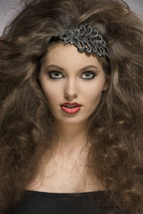 Fototapeta premium close-up of curly brunette girl