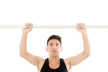 Naklejka premium Man doing chin-ups