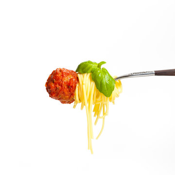 Meatball With Spaghetti And Basil On A Fork