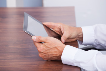 Businessman Using Digital Tablet