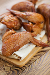 Smoked chicken wings, close-up, vertical shot