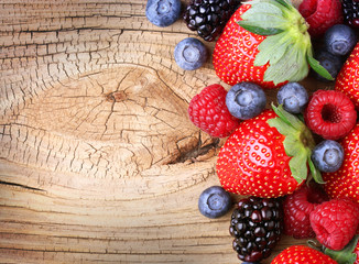 Berries on Wooden Background. Strawberries and Blueberry