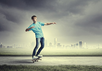 Fototapeta na wymiar Teenager on skateboard