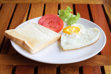 A fried egg and toast breakfast