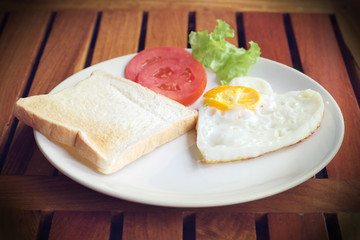 A fried egg and toast breakfast